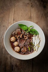 Thai Boat Noodles (Kuay Teow Reua) with Blood Soup, pork, Meatballs, and Basil