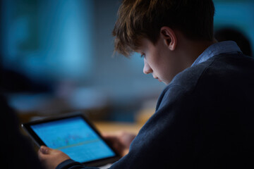 Teen boy student tablet classroom study concentration learning