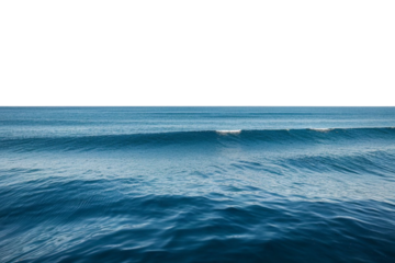 Calm ocean waves rolling gently under a bright sky, perfect for relaxing coastal scenery and travel