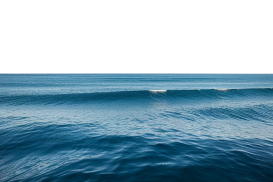 Calm ocean waves rolling gently under a bright sky, perfect for relaxing coastal scenery and travel