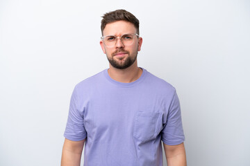 Fototapeta premium Young caucasian man isolated on white background with sad expression