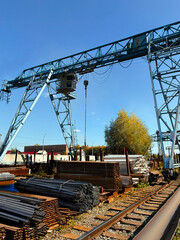 Traveling gantry crane, Base with metal pipes. Vertical photo