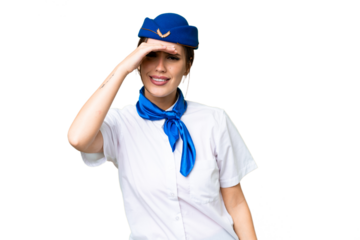 Airplane stewardess over isolated chroma key background looking far away with hand to look something