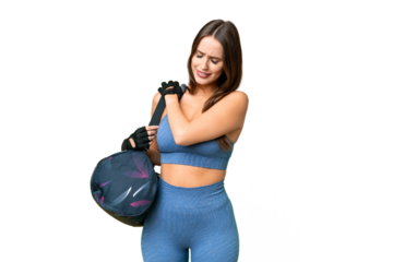 Young sport woman with sport bag over isolated chroma key background suffering from pain in shoulder for having made an effort