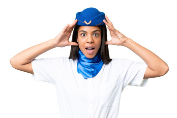 Airplane stewardess African american woman over isolated background with surprise expression