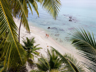 Stunning beach scene on Koh Kood Island, Thailand with people enjoying the tropical paradise