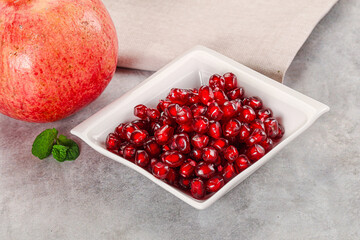 Ripe sweet red pomegranate seeds