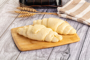 Raw uncooked croissant for bake