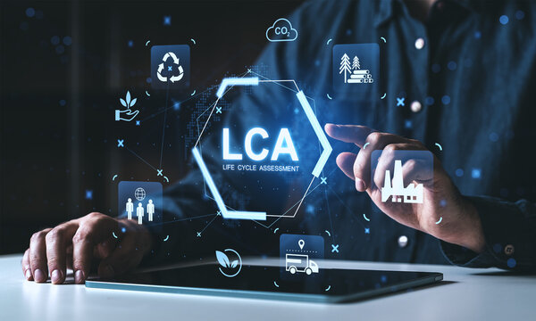 Life Cycle Assessment (LCA) concept with digital icons of sustainability, industry, and environment on futuristic interface screen in creative workspace..