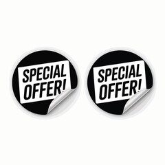 Two black circles with white special offer stickers
