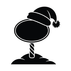 Christmas signpost with santa hat and snow