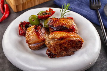 Roasted duck medallion with dry tomato
