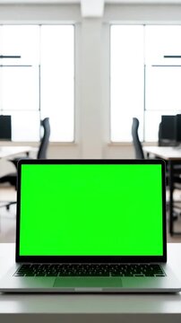 Empty Productivity Hub with laptop on the desk in office shows green mock up screen background bright creative open space loft professional working distortion, overlay, glitch, static noise, scan
