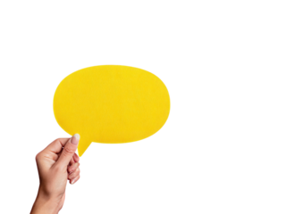 A hand holding a yellow speech bubble
