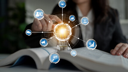 A business professional is interacting with digital icons while studying data in a modern office. This image showcases innovation and strategy in the workplace. Crux