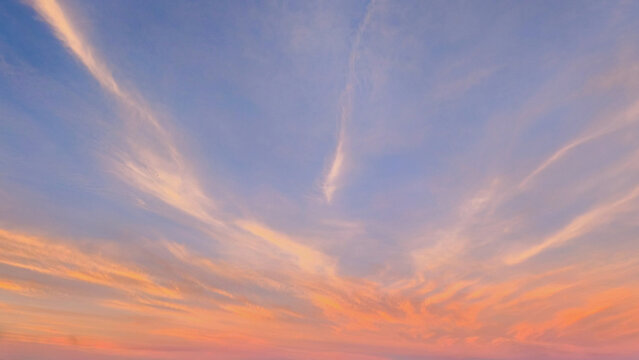 Beautiful sunset sky with wispy clouds and vibrant colors