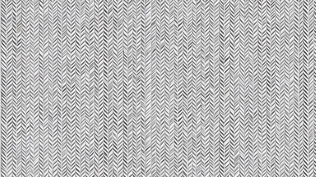 Detailed gray herringbone pattern forms a subtle textured background.