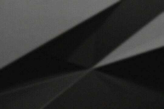 An abstract close-up shot of architectural geometric shapes in monochrome