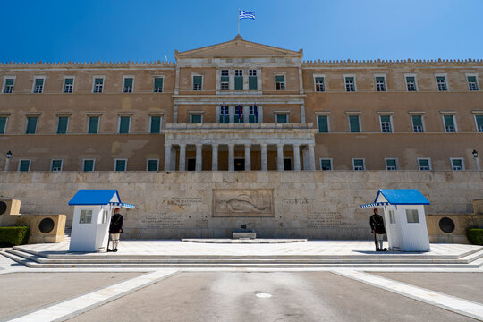 Greece, Athens, Syntagma Square - April 9, 2024 - Scene with the Old Royal Palace and the guards at Syntagma Square in Athens