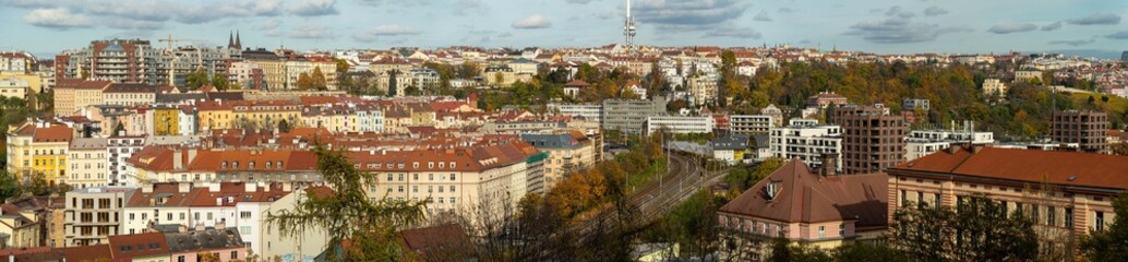 Wide panorama of Prague in the fall with the Czech TV tower.
