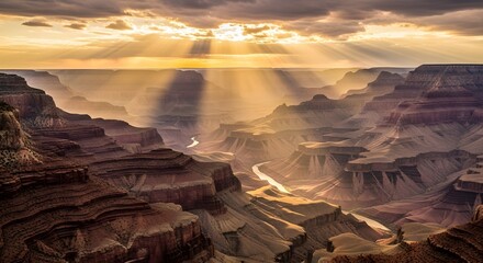 Grand Canyon Sunset: Witness the majestic beauty of the Grand Canyon bathed in the warm embrace of the setting sun, where the interplay of light and shadow unveils nature's grandeur.