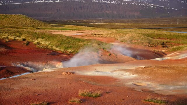 Mud pot, hot spring, fumarole in the landscape - north of Iceland