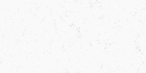 Fototapeta premium Subtle abstract background texture with scattered light gray and dark gray speckles on a clean white surface