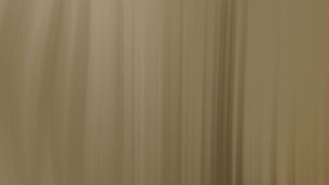 Moving abstract blurred gold background.