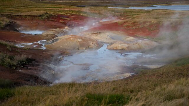 Mud pot, hot spring, fumarole in the landscape - north of Iceland