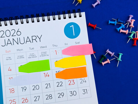 colourful sticky notes on january 2026 calendar planning and organization concept for new year business schedule