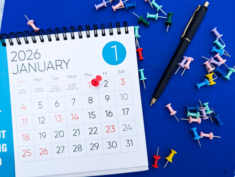 2026 january month calendar with pushpin for scheduling business appointments, holiday events, and marking important new year dates