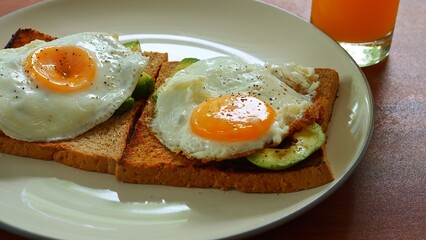 Fresh morning scene with toast avocado and fried egg symbolizing healthy vegetarian lifestyle Bright colors enhance natural mood promoting vegetarian breakfast and balanced vegetarian energy