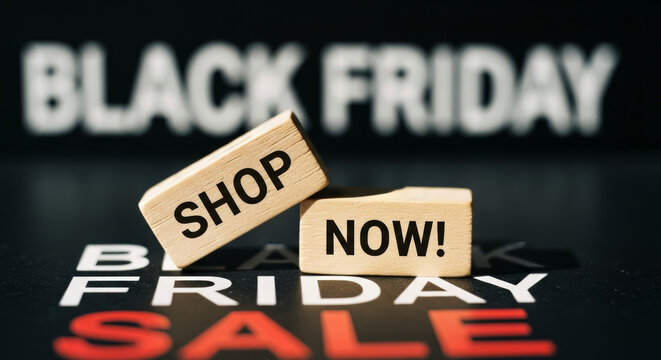 Two wooden blocks with Shop Now text sit atop a Black Friday Sale background, urging viewers to seize deals and discounts in this highenergy promotional shot. - Powered by Adobe