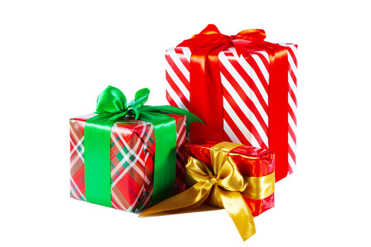 Elegant red and green gift boxes with bows. Isolated on a white background.