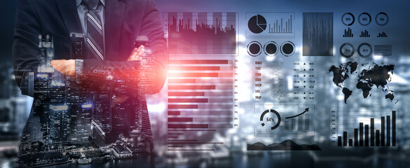 A professional businessman stands confidently amidst a backdrop of financial data and graphs, showcasing urban progress and economic insight in a vibrant night setting. Impute