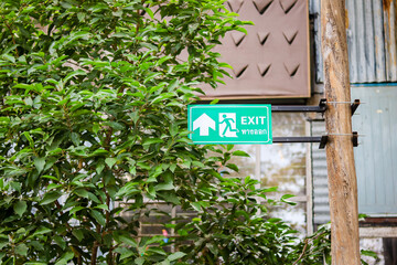 Exit sign on a wooden pole