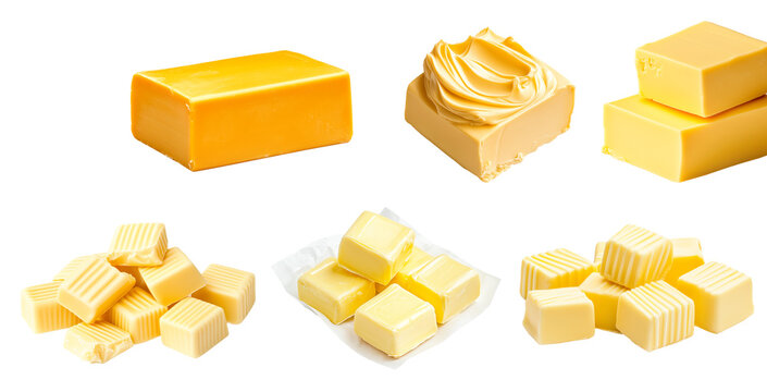 Set of butter cubes stacked on piece of paper isolated on white background. Concept of dairy products and cooking ingredients