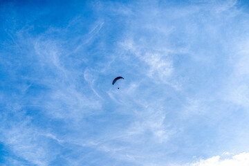 paragliding in the blue sky