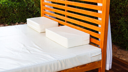 A place for relaxation and massage near the pool.