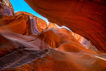 Scenic view of Antelope Canyon with warm summer light enhancing textures of rocks and sand