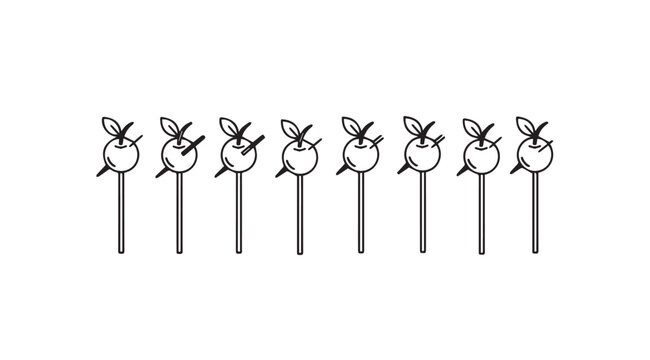 A row of whimsical fruit or vegetable silhouettes on sticks silhouette