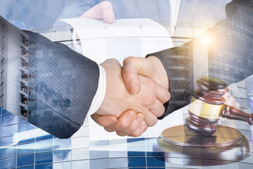 The handshake of the lawyers and the judges gavel .