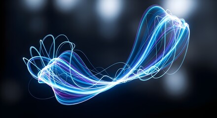 Abstract blue and purple light trails swirling in darkness