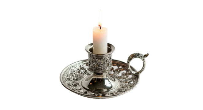 Ornate silver candle holder with burning candle on black background