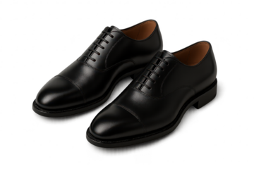 Luxury black leather Oxford dress shoes isolated on transparent background.