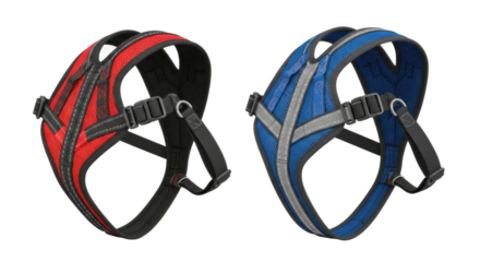Red and blue dog harnesses with reflective straps and adjustable buckles