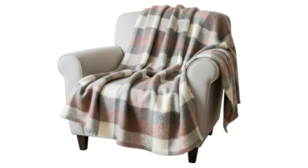 Cozy checkered blanket on comfortable armchair for home interior design inspiration