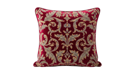 Ornate red cushion with intricate golden embroidery on black background