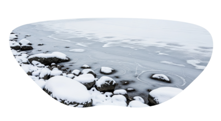 Serene winter landscape with snow-covered rocks on frozen lake