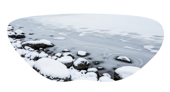 Serene winter landscape with snow-covered rocks on frozen lake